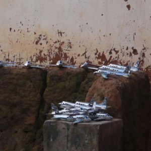 Making tin can aeroplanes - Antananarivo region